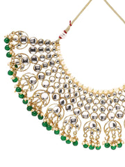 Glimmering Kundan Elegance and Green Stones Jewellery Set with Maangtika