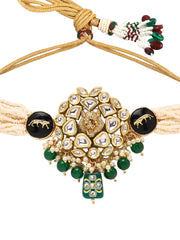 Royal Kundan Elegance with Lion-Faced Chocker and Green Stone Earrings