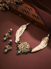 Royal Kundan Elegance with Lion-Faced Chocker and Green Stone Earrings