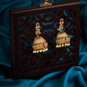 Matt gold ruby green pota stone jhumkas